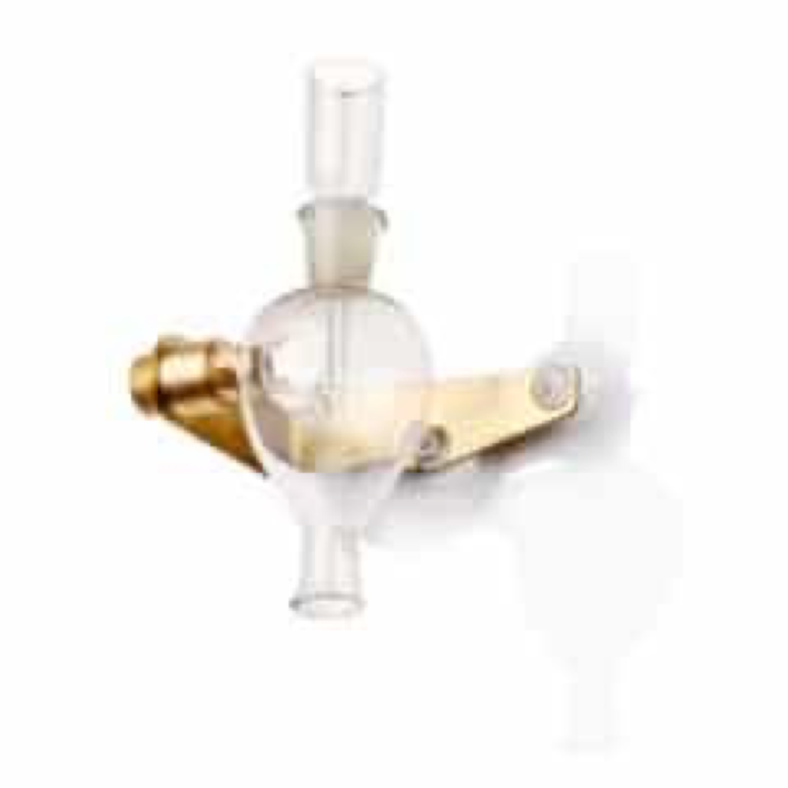 A glass and measuring device with gold and plastic parts, probably in a laboratory setting.